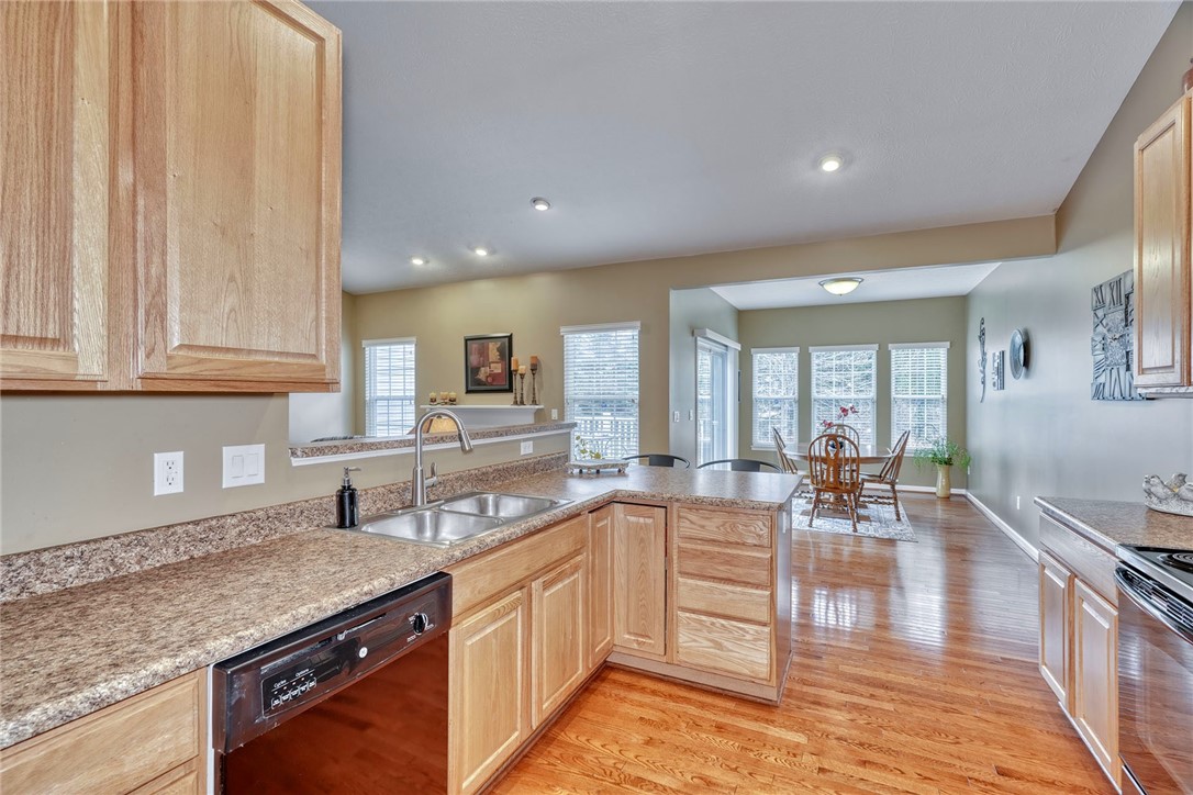1082 Railway Crossing Webster, NY 14580 - Photo 13 of 43 MORE OF THE KITCHEN - VIEW TO DINING AREA - VAULTE