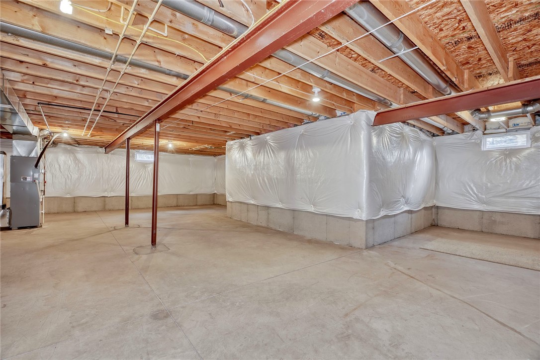 1082 Railway Crossing Webster, NY 14580 - Photo 26 of 43 FULL DRY TALL BASEMENT WITH POURED WALLS