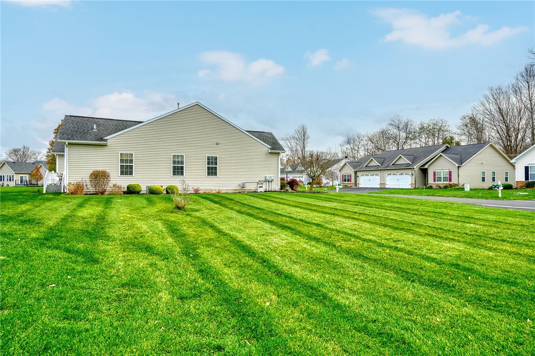 1082 Railway Crossing Webster, NY 14580 - Photo 36 of 43 MORE OF THE SIDE YARD GREEN AREA