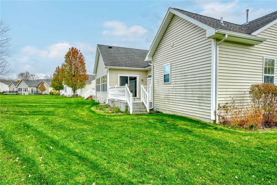 1082 Railway Crossing Webster, NY 14580 - Photo 37 of 43 BACKYARD STAIRS TO DECK