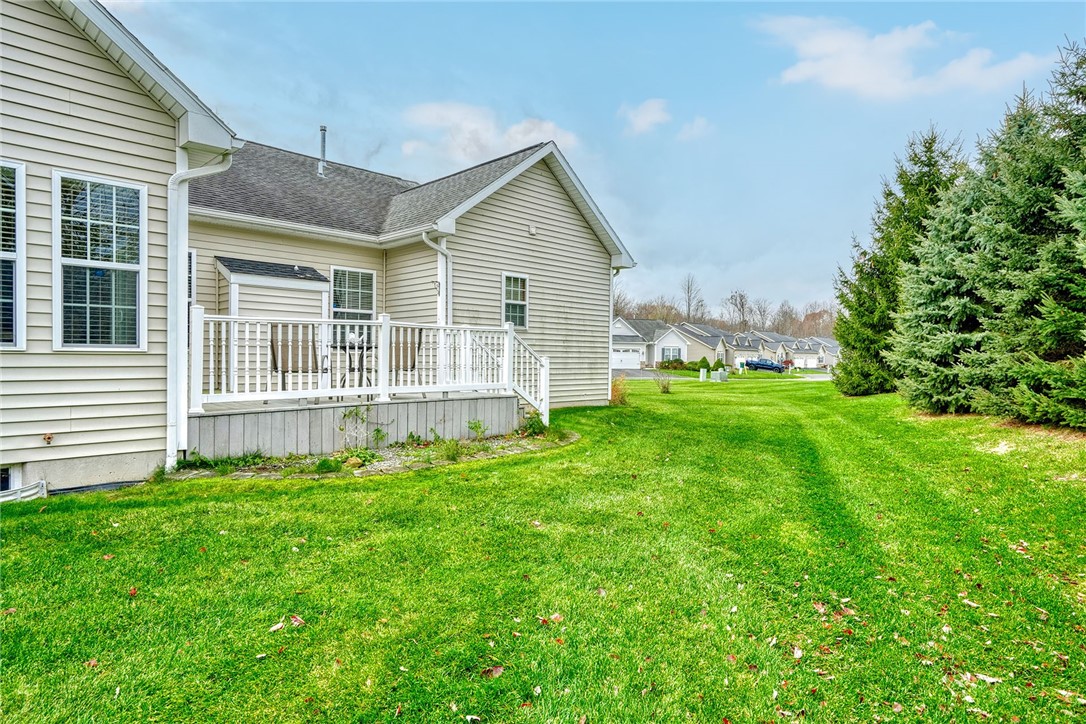 1082 Railway Crossing Webster, NY 14580 - Photo 38 of 43 BACKYARD VIEW OF THE DECK