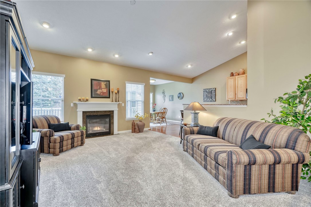 1082 Railway Crossing Webster, NY 14580 - Photo 4 of 43 GREAT ROOM WITH SOARING CEILING, GAS FIREPLACE, PL