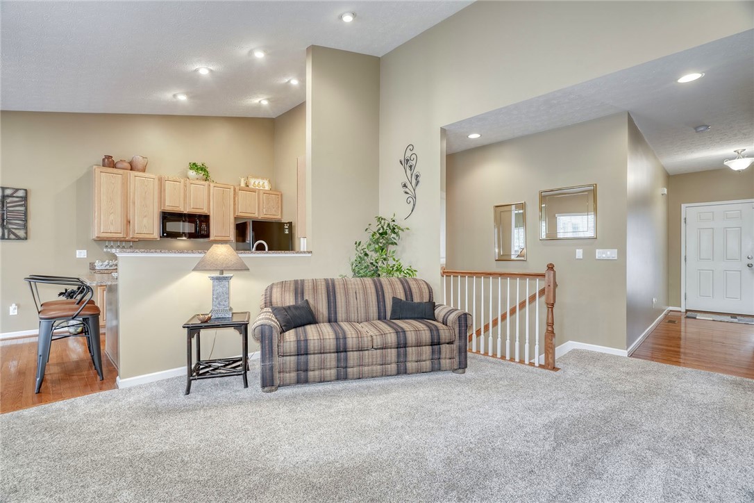 1082 Railway Crossing Webster, NY 14580 - Photo 5 of 43 GREAT ROOM OPENS TO KITCHEN *OPEN STAIRCASE TO BAS