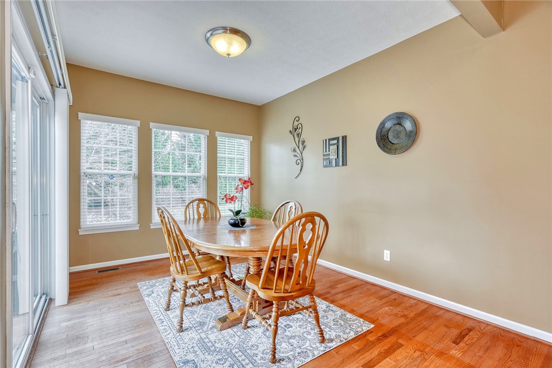 1082 Railway Crossing Webster, NY 14580 - Photo 6 of 43 MORNING/DINING ROOM WITH BEAUTIFUL HARDWOODS!
