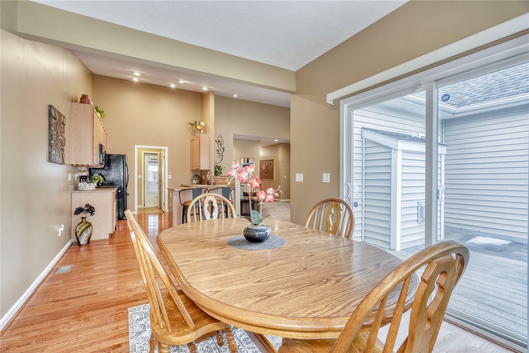 1082 Railway Crossing Webster, NY 14580 - Photo 9 of 43 DINING ROOM * SLIDER TO DECK