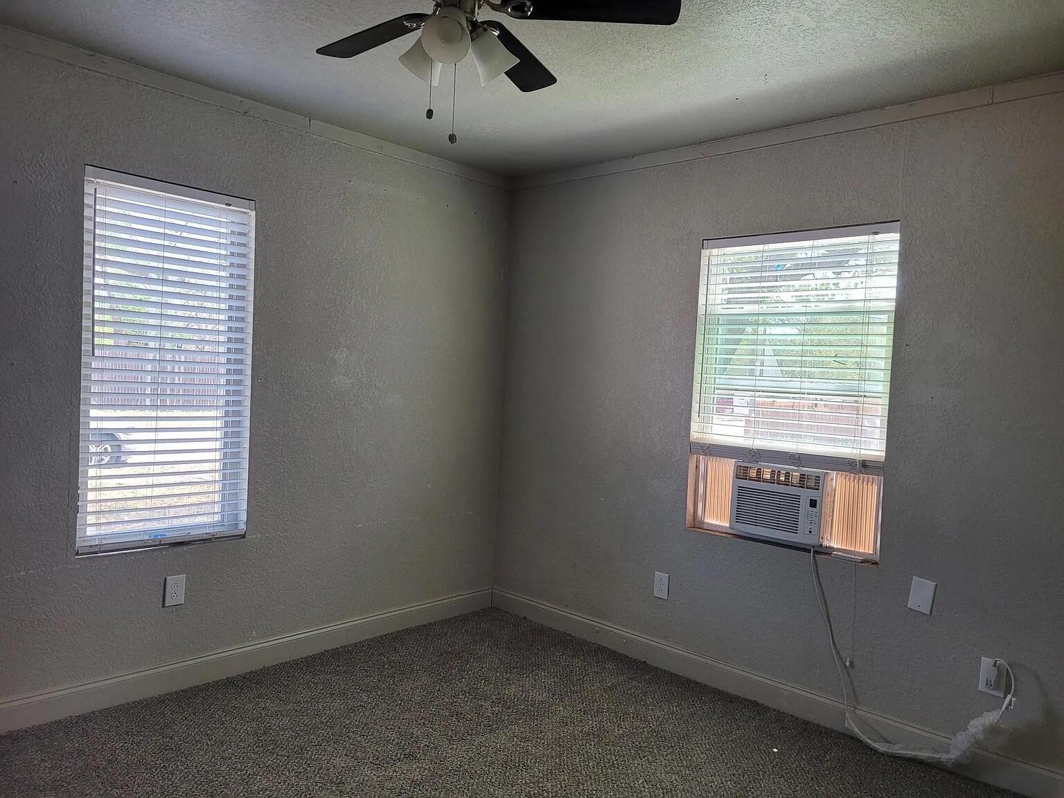 2404 Avenue U, Unit FRONT Lubbock, TX 79411 - Photo 5 of 10 a view of an empty room with a window