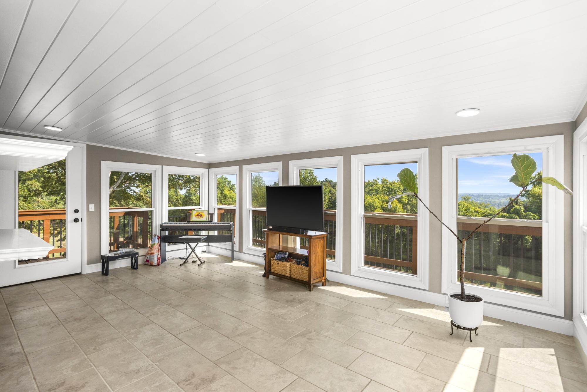8733 Haselton Road Nashville, TN 37221 - Photo 13 of 29 a living room with furniture and large window