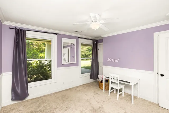 a view of a livingroom with furniture and window