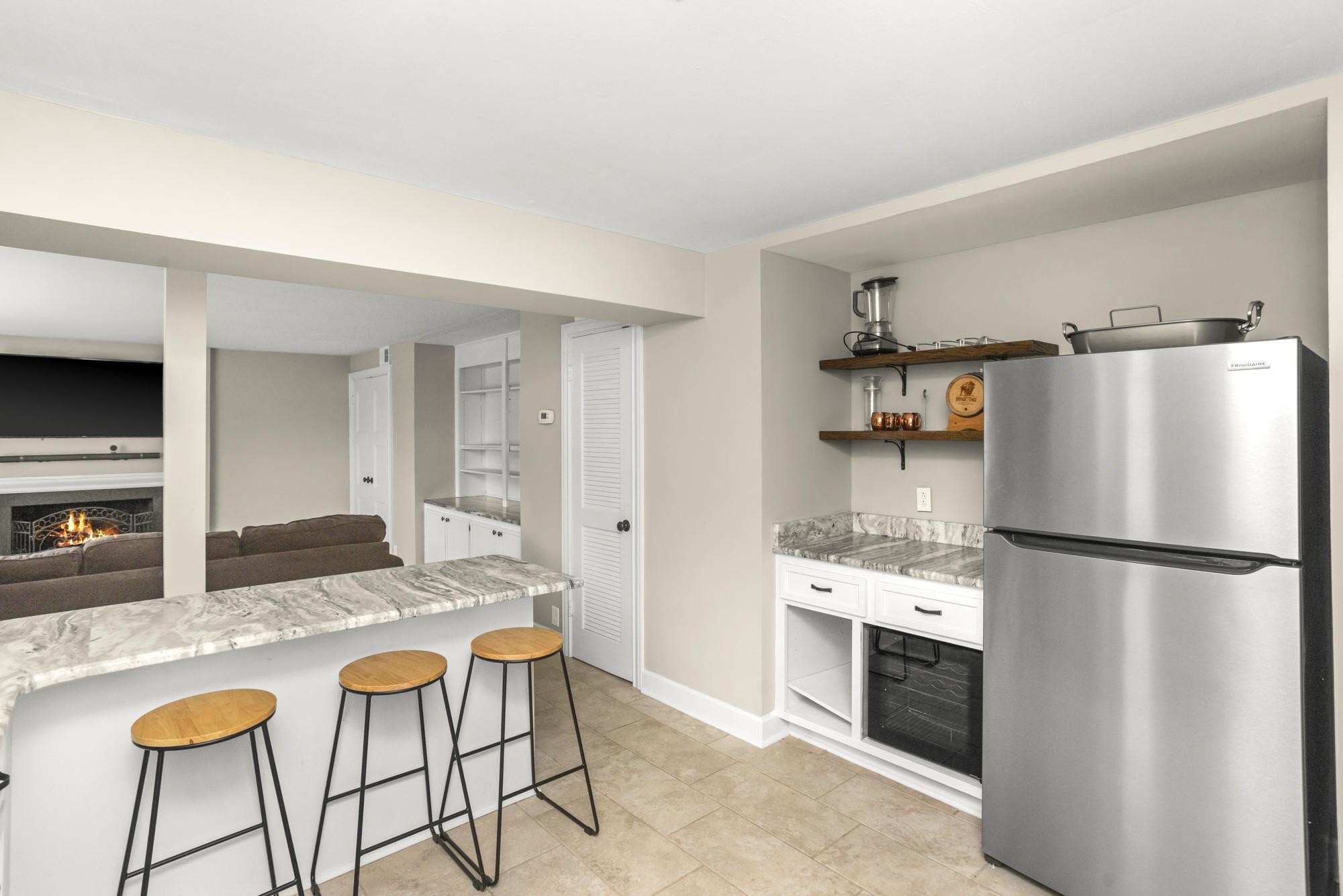 8733 Haselton Road Nashville, TN 37221 - Photo 27 of 29 a kitchen with stainless steel appliances granite countertop a refrigerator and a stove top oven