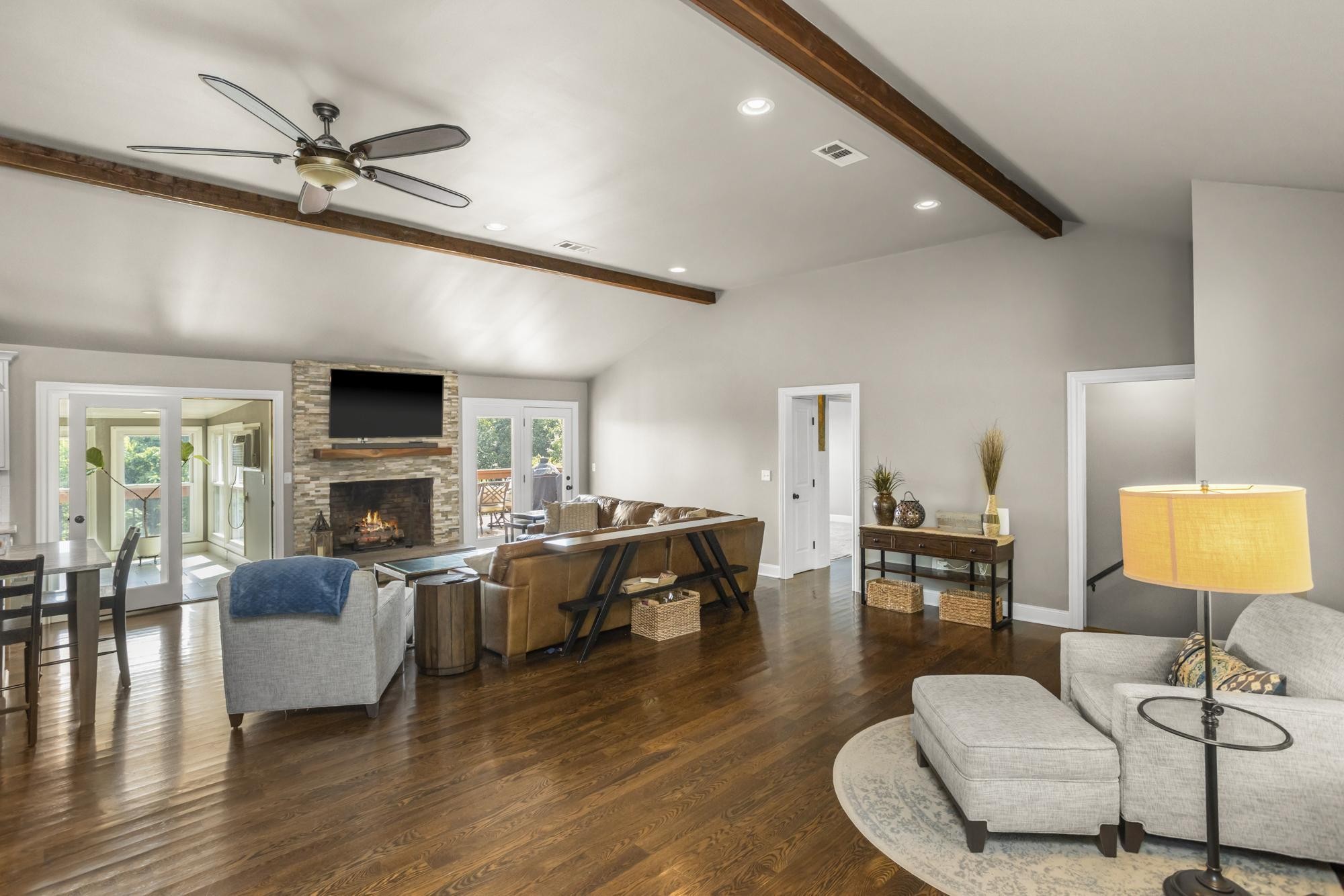 8733 Haselton Road Nashville, TN 37221 - Photo 8 of 29 a living room with fireplace furniture and a wooden floor
