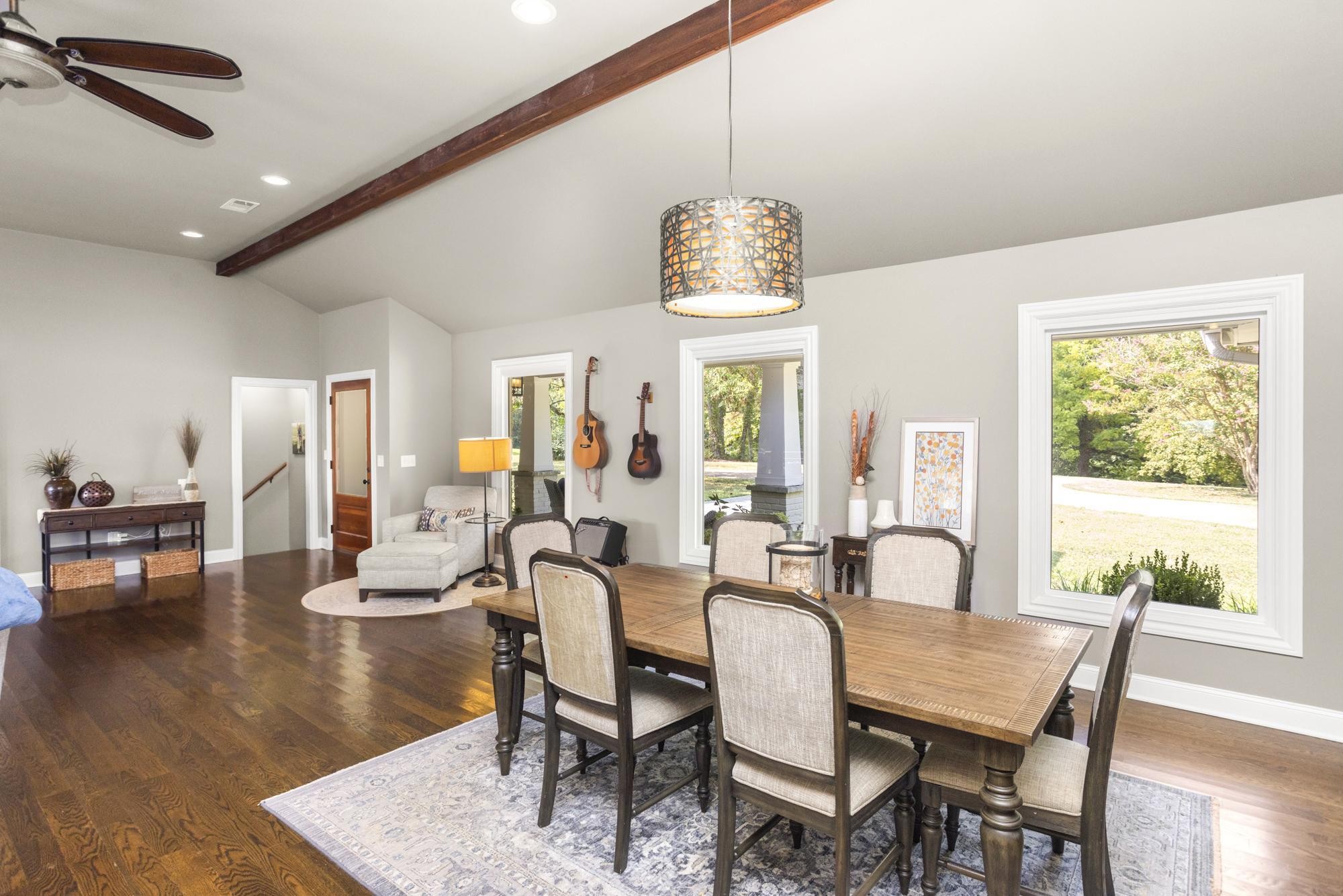 8733 Haselton Road Nashville, TN 37221 - Photo 9 of 28 a view of a dining room with furniture window and wooden floor