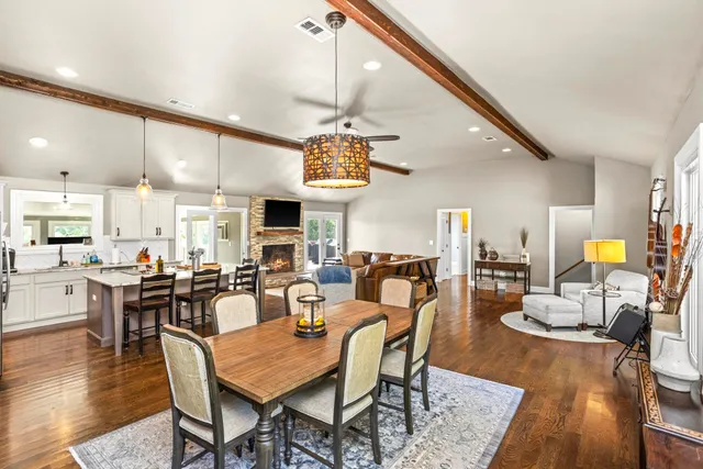 a view of a dining area with furniture window and wooden floor