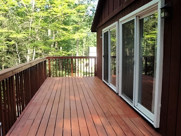 7 Carey Road Sturbridge, MA 01566 - Photo 3 of 27 a view of balcony with wooden floor