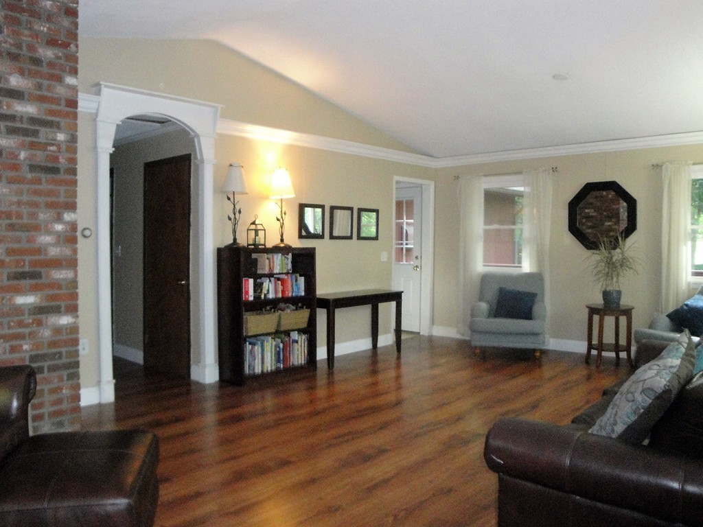 7 Carey Road Sturbridge, MA 01566 - Photo 4 of 27 a living room with furniture and a wooden floor
