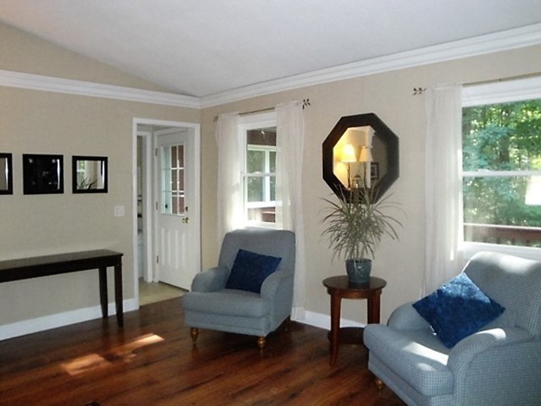 7 Carey Road Sturbridge, MA 01566 - Photo 5 of 27 a living room with furniture and a large window