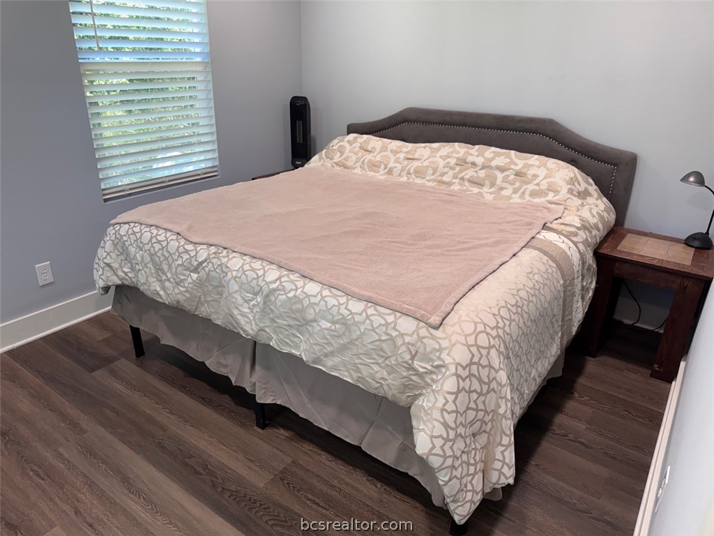3454 Co Road Marquez, TX 77865 - Photo 21 of 35 a bed sitting in a bedroom next to a window