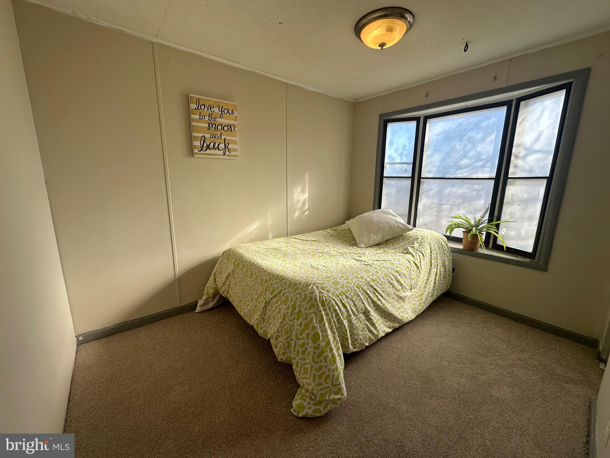 3532 Wagon Train Road Middle River, MD 21220 - Photo 21 of 28 a bedroom with a bed and a window