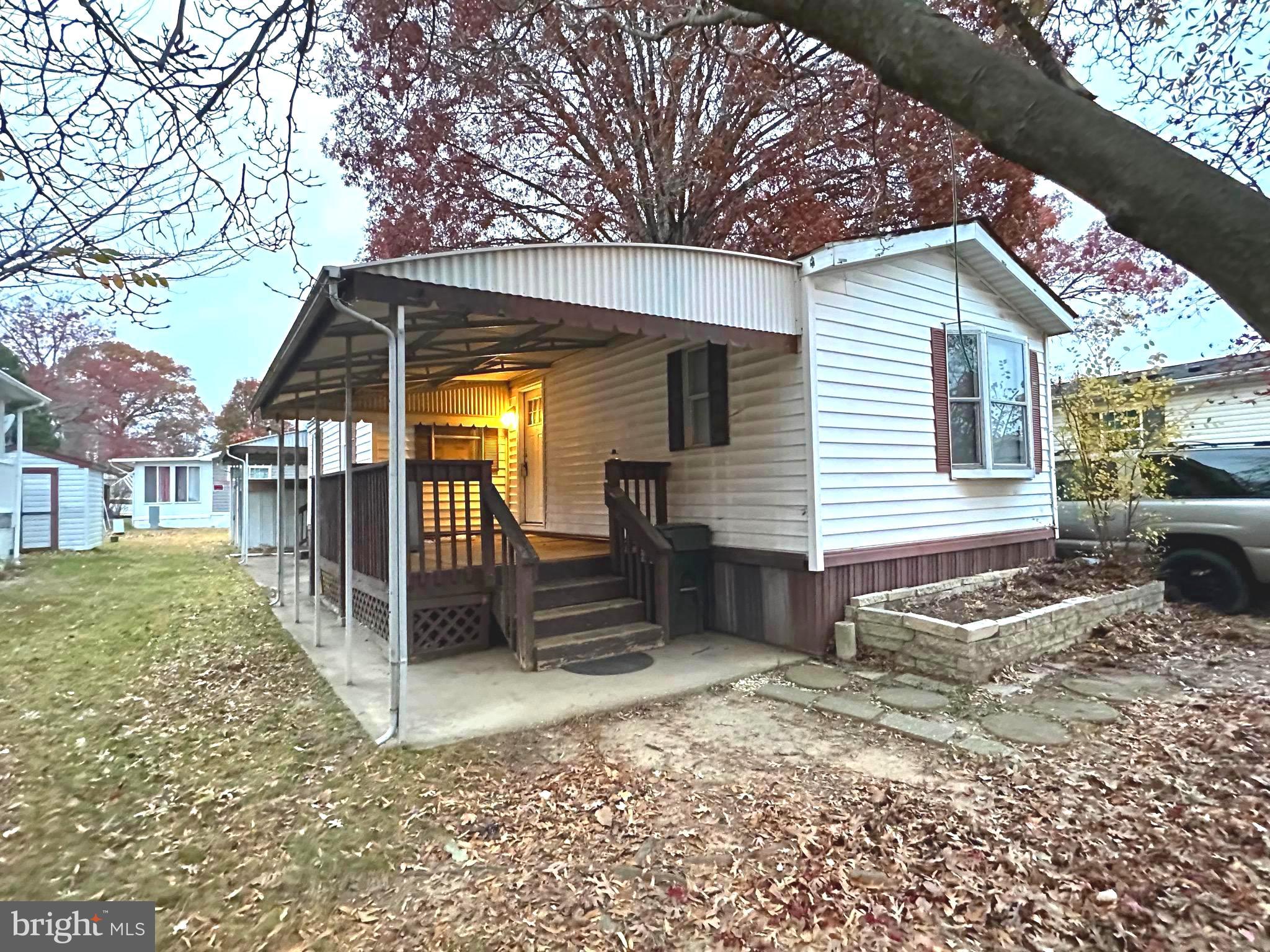 3532 Wagon Train Road Middle River, MD 21220 - Photo 25 of 28 a view of a house with a yard and wooden fence