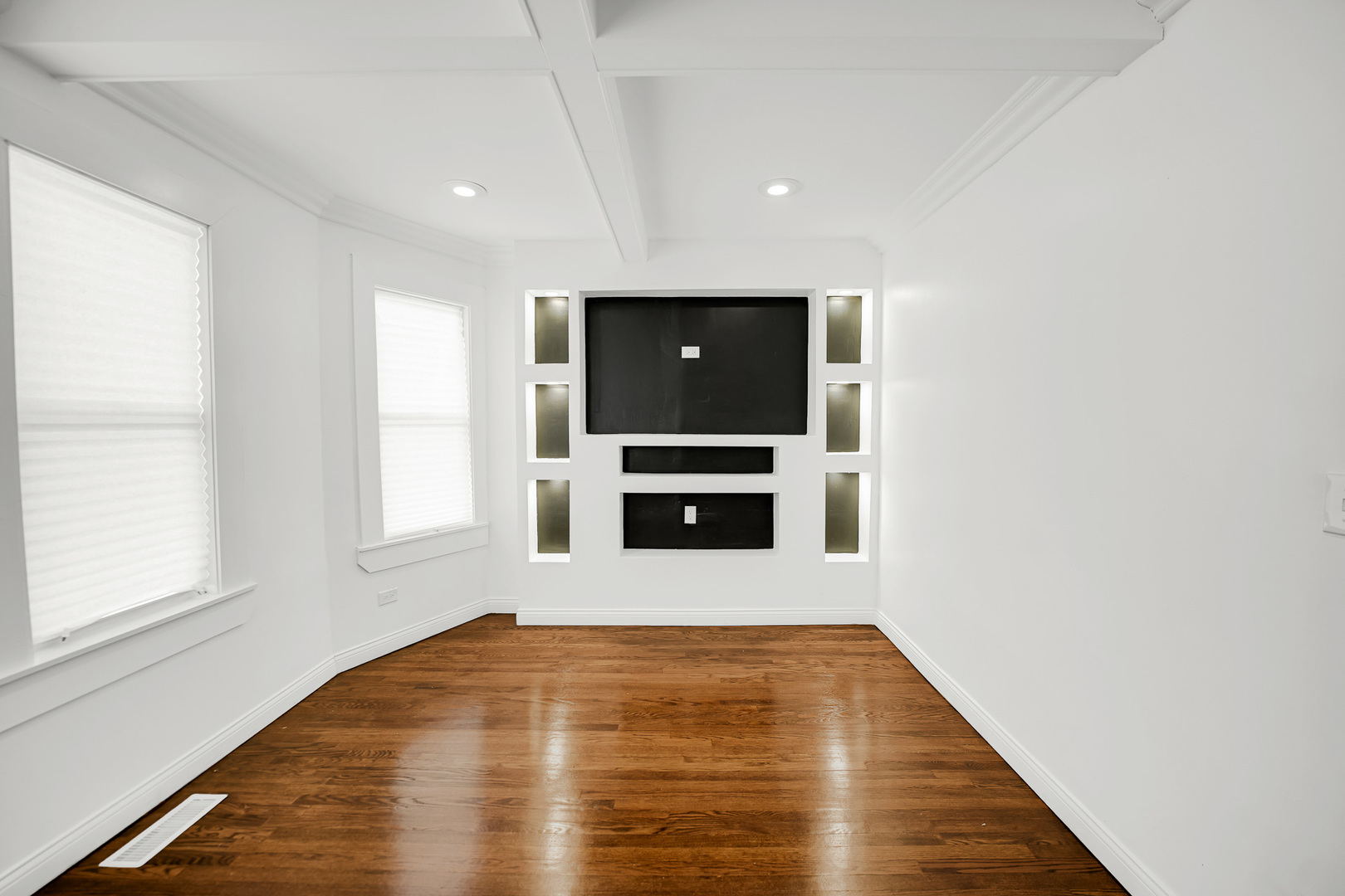 9327 South Elizabeth Street Chicago, IL 60620 - Photo 2 of 18 a view of an empty room with a kitchen and window