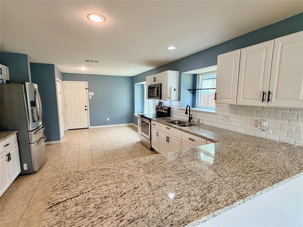 7102 Lyons Road Garland, TX 75043 - Photo 8 of 32 Gallery Image 8