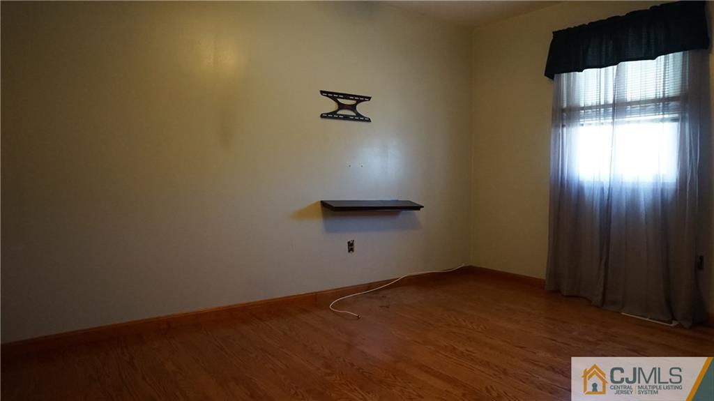 8 Plumstead Road Sewell, NJ 08080 - Photo 17 of 25 an empty room with a window