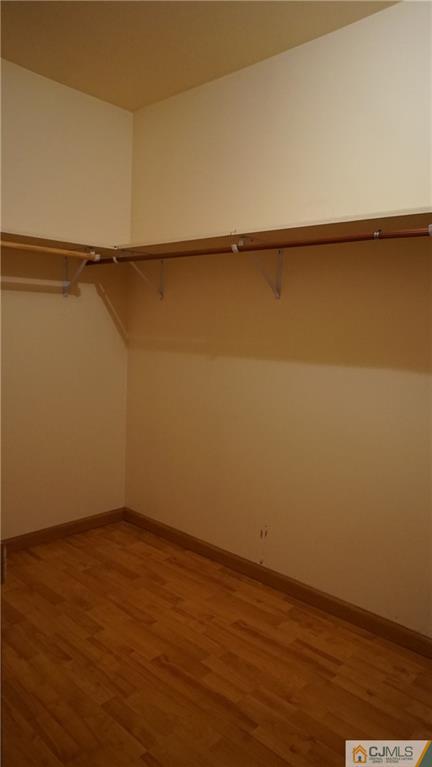 8 Plumstead Road Sewell, NJ 08080 - Photo 23 of 25 a view of walk in closet with clothes