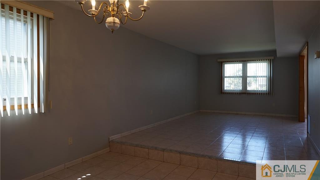 8 Plumstead Road Sewell, NJ 08080 - Photo 7 of 25 an empty room with windows