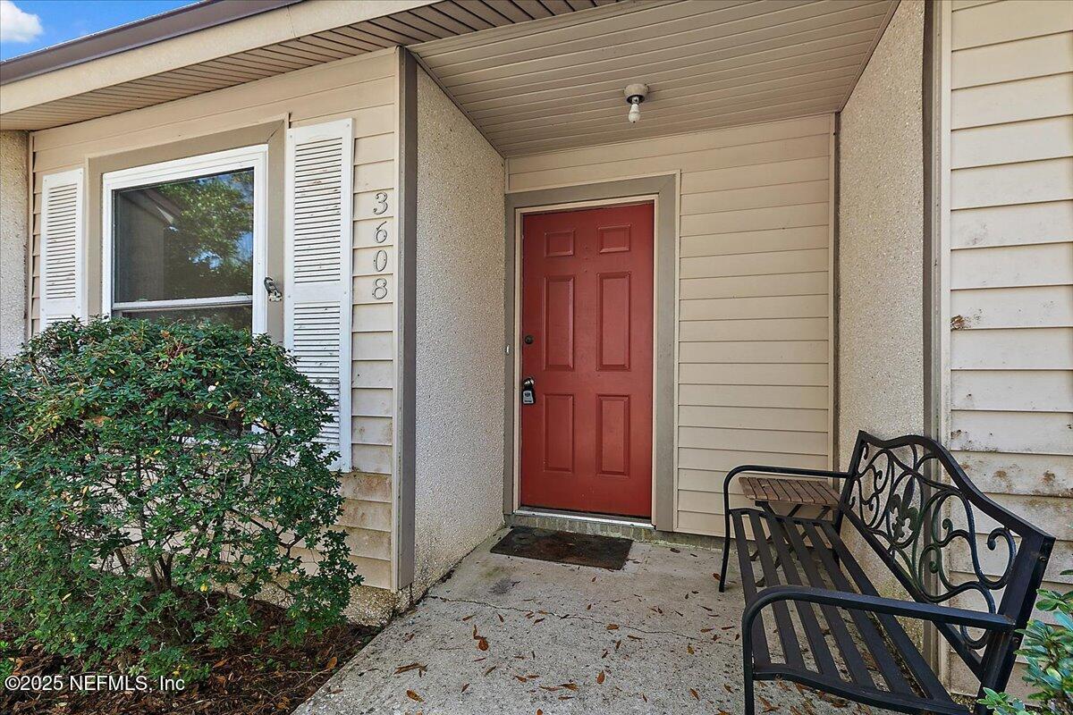 3608 Chappi Way Jacksonville, FL 32223 - Photo 2 of 14 a view of two chairs in the balcony