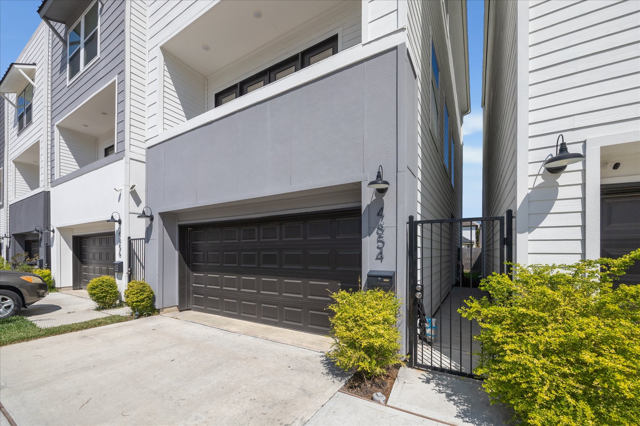 4854 Brinkman Street Houston, TX 77018 - Photo 2 of 30 Contemporary design with a private gated side entry, sleek finishes, and a spacious two-car garage.
