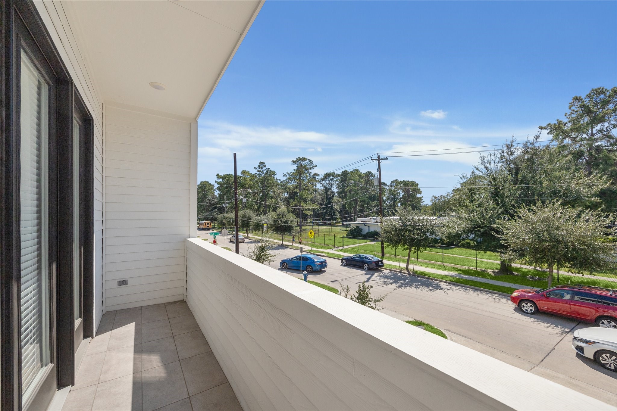 4854 Brinkman Street Houston, TX 77018 - Photo 24 of 30 Balcony space just off the living room provides an inviting spot to unwind or enjoy your morning coffee.