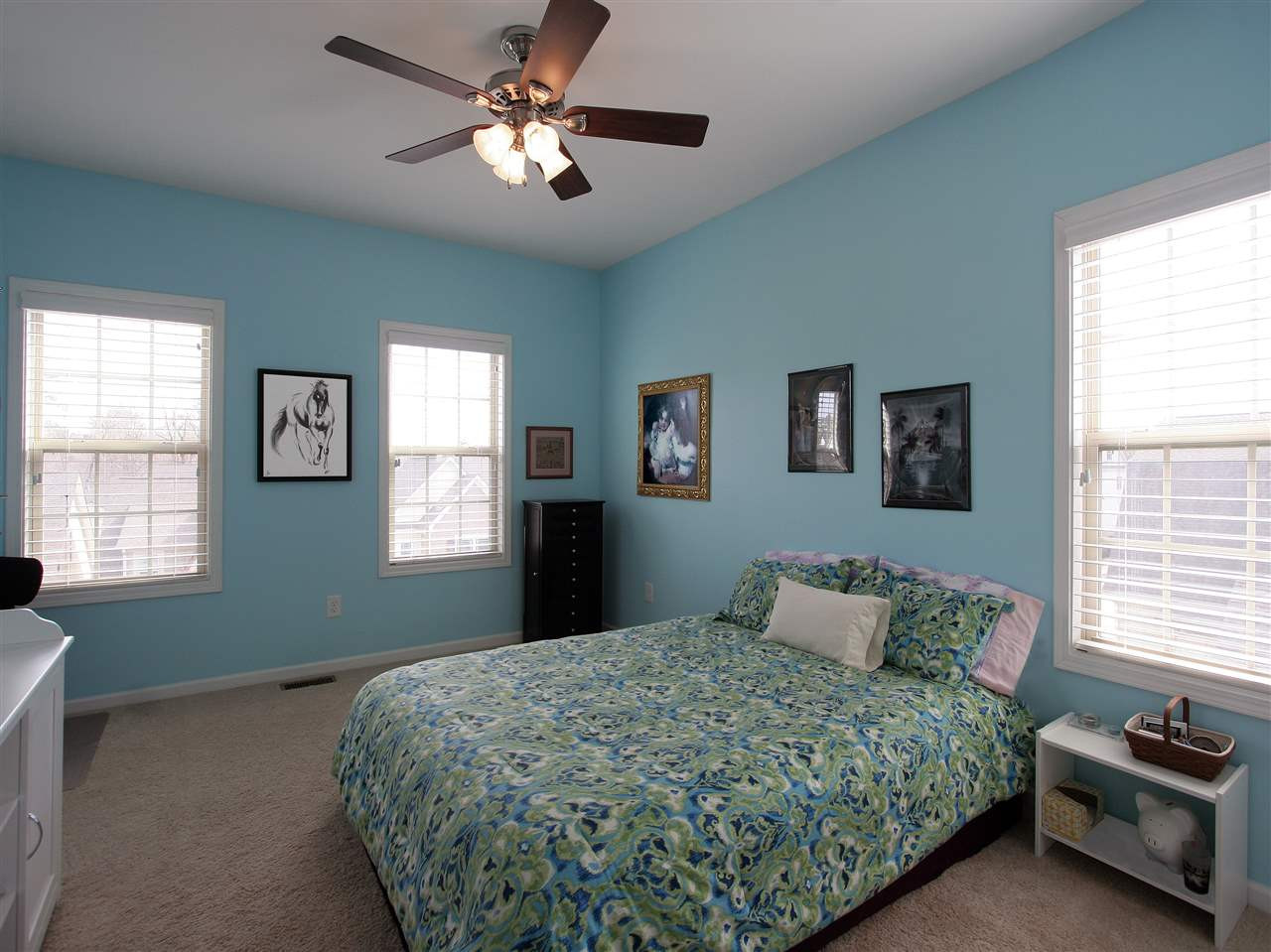 1517 Rodessa Run Raleigh, NC 27607 - Photo 16 of 25 Upstairs secondary bedrooms have plush carpet, ceiling fans, and lots of windows. Bedroom