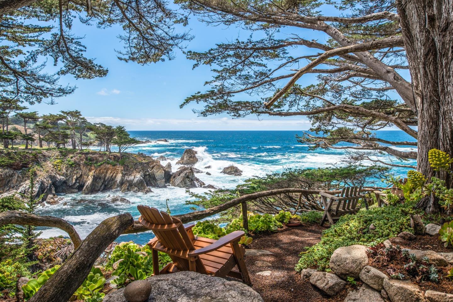 157-163 Spindrift Road Carmel, CA 93923 - Photo 8 of 100 a view of a lake with a beach