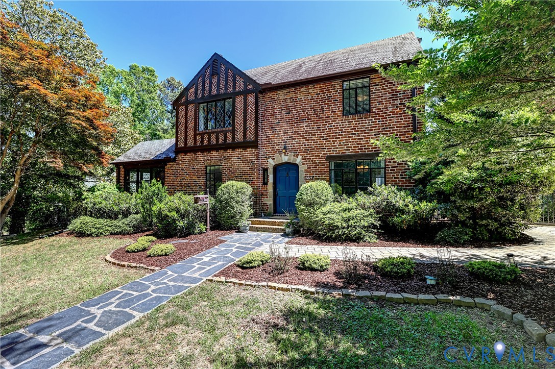 4814 Riverside Drive Richmond, VA 23225 - Photo 1 of 39 a front view of house with yard and green space