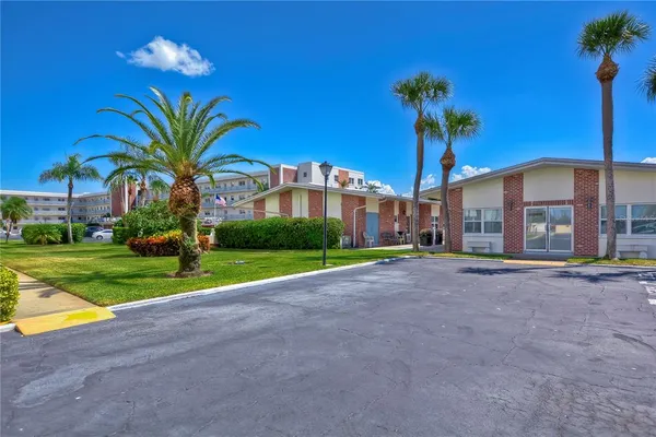a view of yard with patio