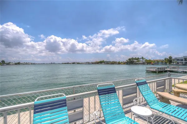 a view of a lake with a terrace