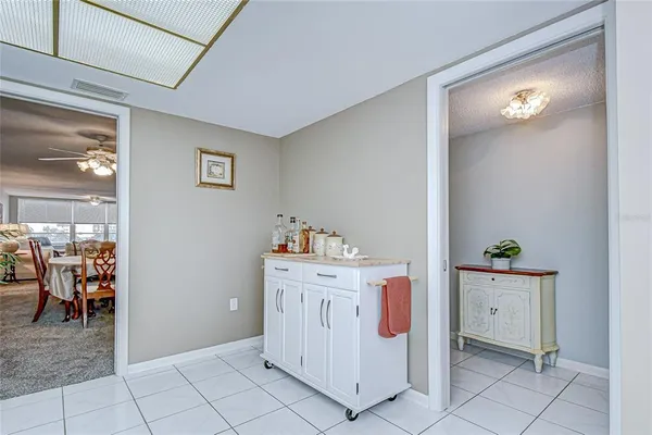 a view of a dining room with furniture and window