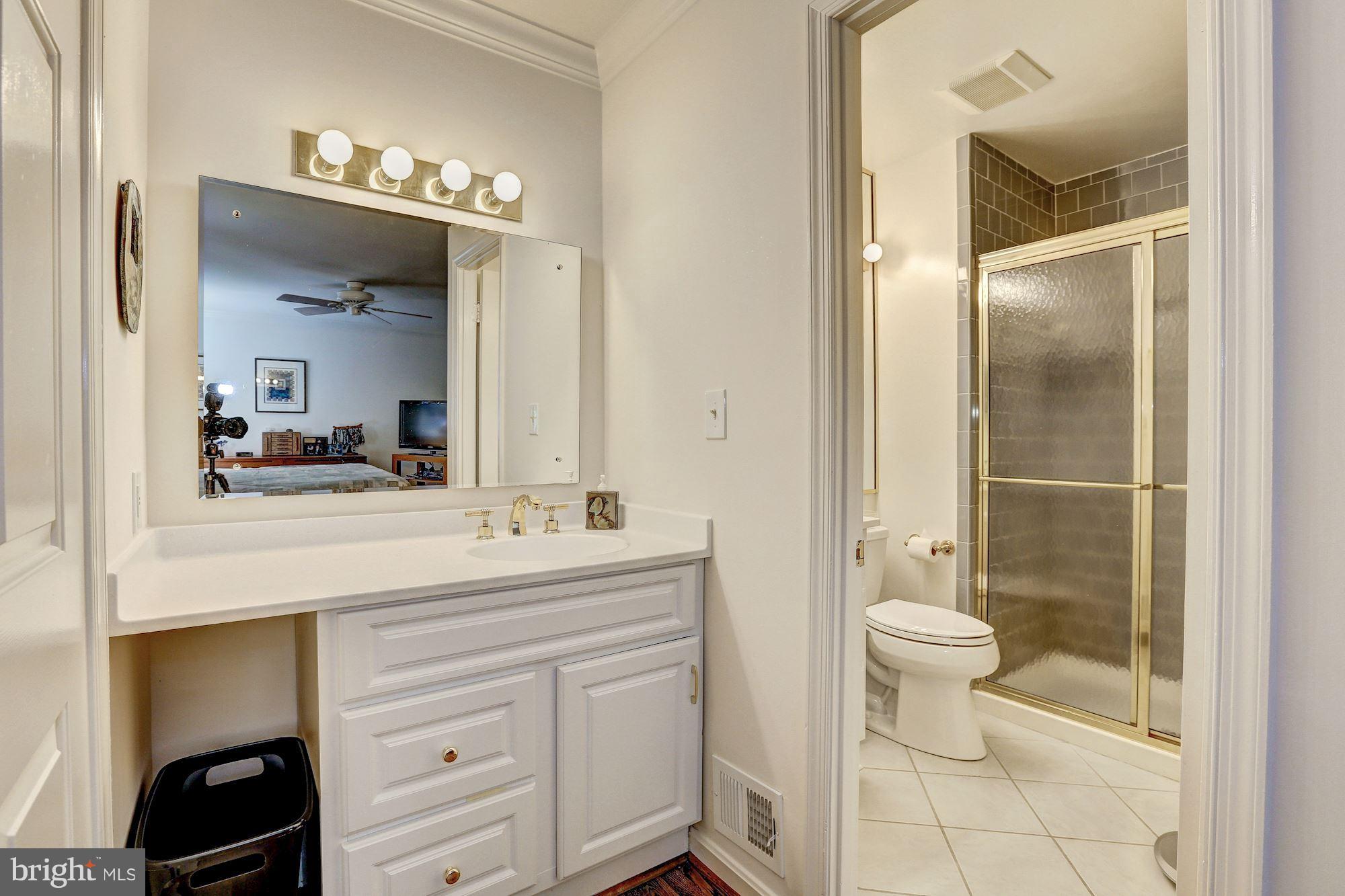 14900 Notley Road Silver Spring, MD 20905 - Photo 22 of 30 DRESSING AREA, HI-RISE COMMODE, STEP-IN SHOWER