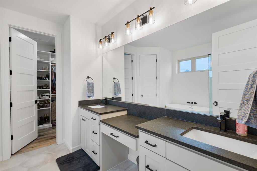 476 Silverleaf Drive Sunset, TX 76270 - Photo 24 of 40 a kitchen with a sink and cabinets