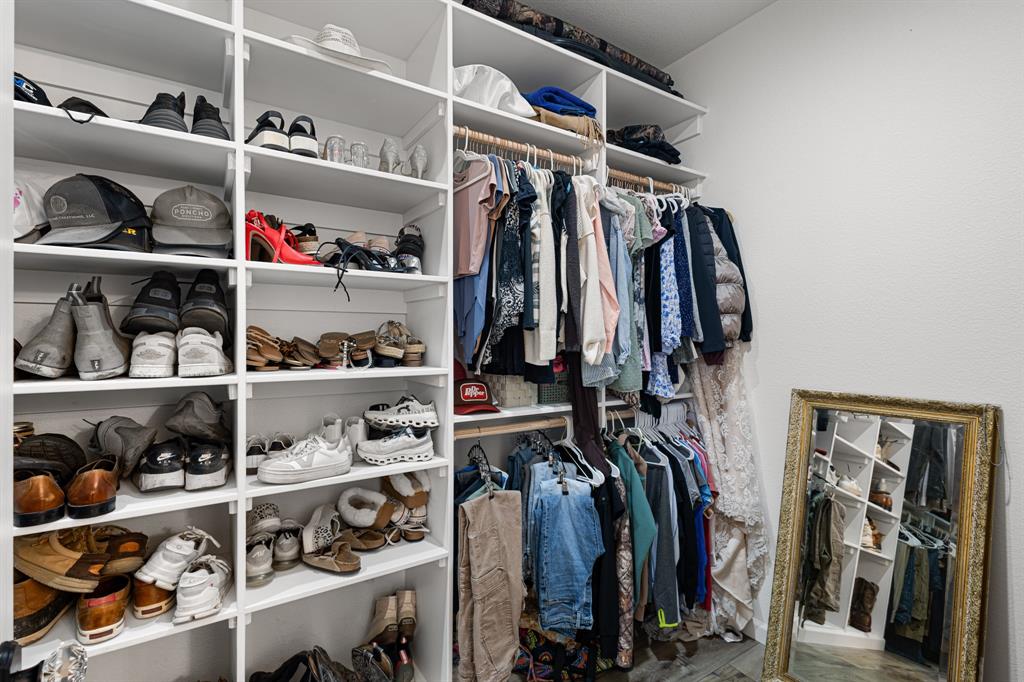 476 Silverleaf Drive Sunset, TX 76270 - Photo 25 of 40 a view of walk in closet with clothes and shoes
