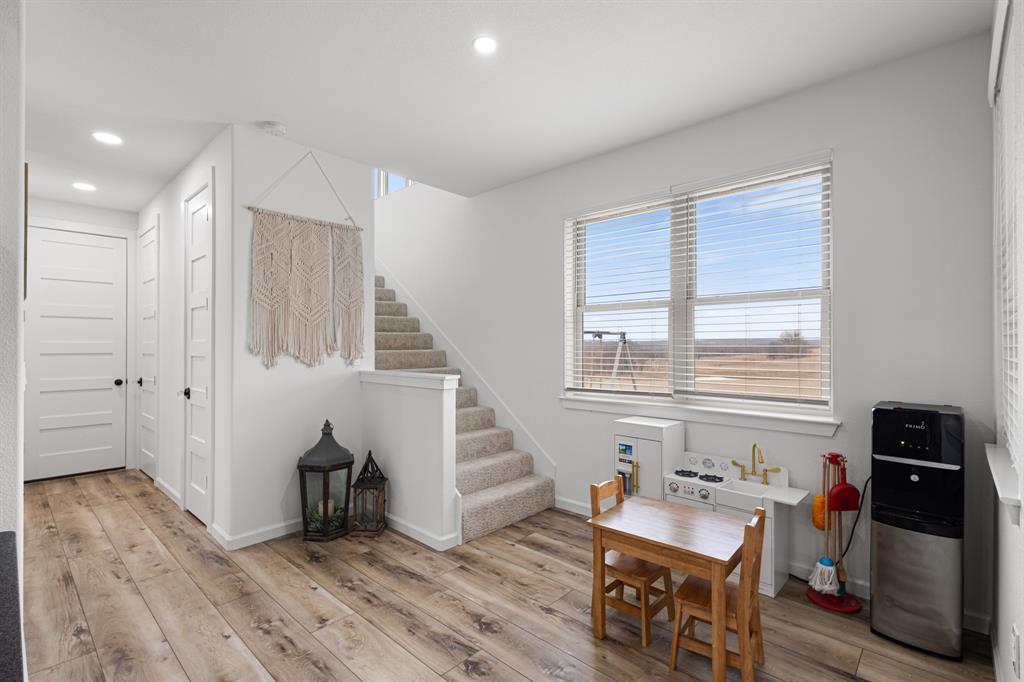 476 Silverleaf Drive Sunset, TX 76270 - Photo 26 of 40 a view of a workspace with wooden floor and windows