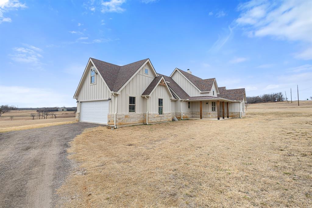 476 Silverleaf Drive Sunset, TX 76270 - Photo 3 of 40 a view of a house with a ocean view