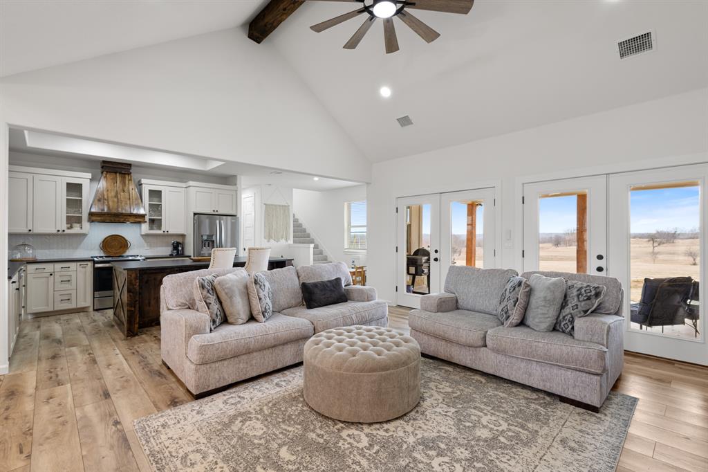 476 Silverleaf Drive Sunset, TX 76270 - Photo 4 of 40 a living room with furniture and kitchen view