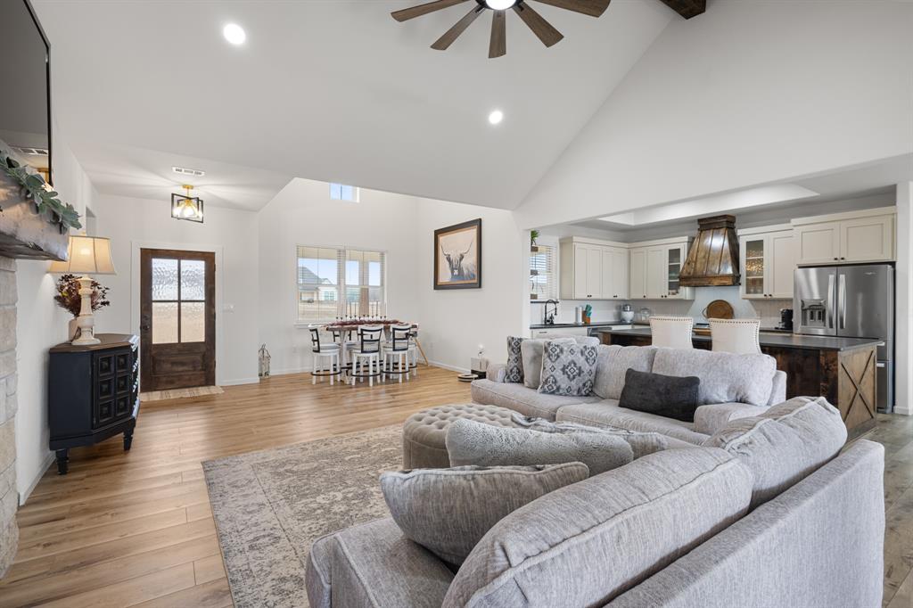 476 Silverleaf Drive Sunset, TX 76270 - Photo 7 of 40 a living room with furniture and a wooden floor