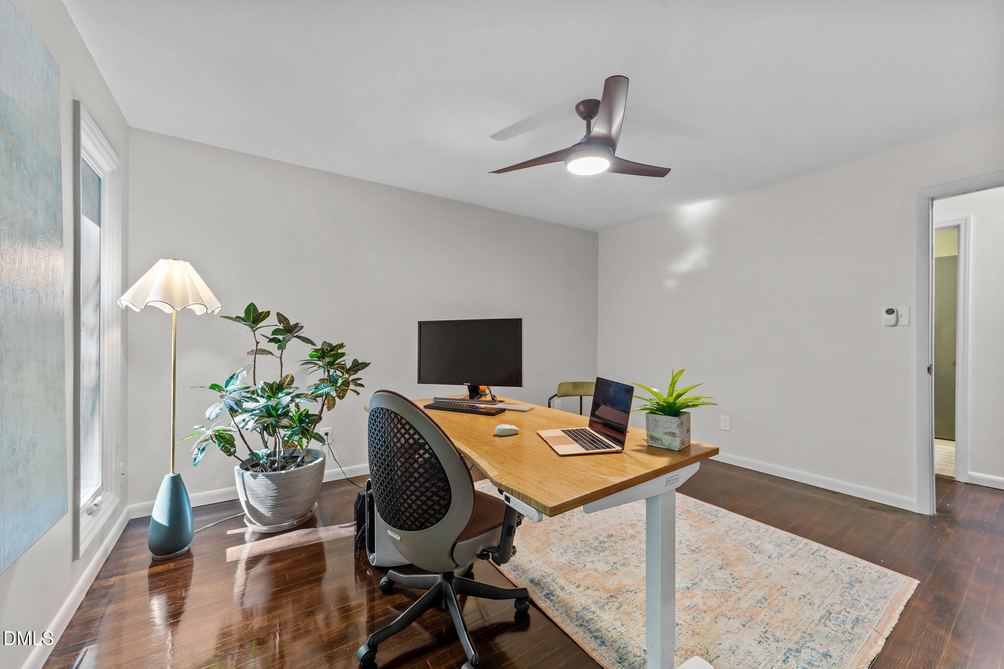 105 Barcliff Terrace Cary, NC 27518 - Photo 24 of 47 a workspace with furniture and wooden floor