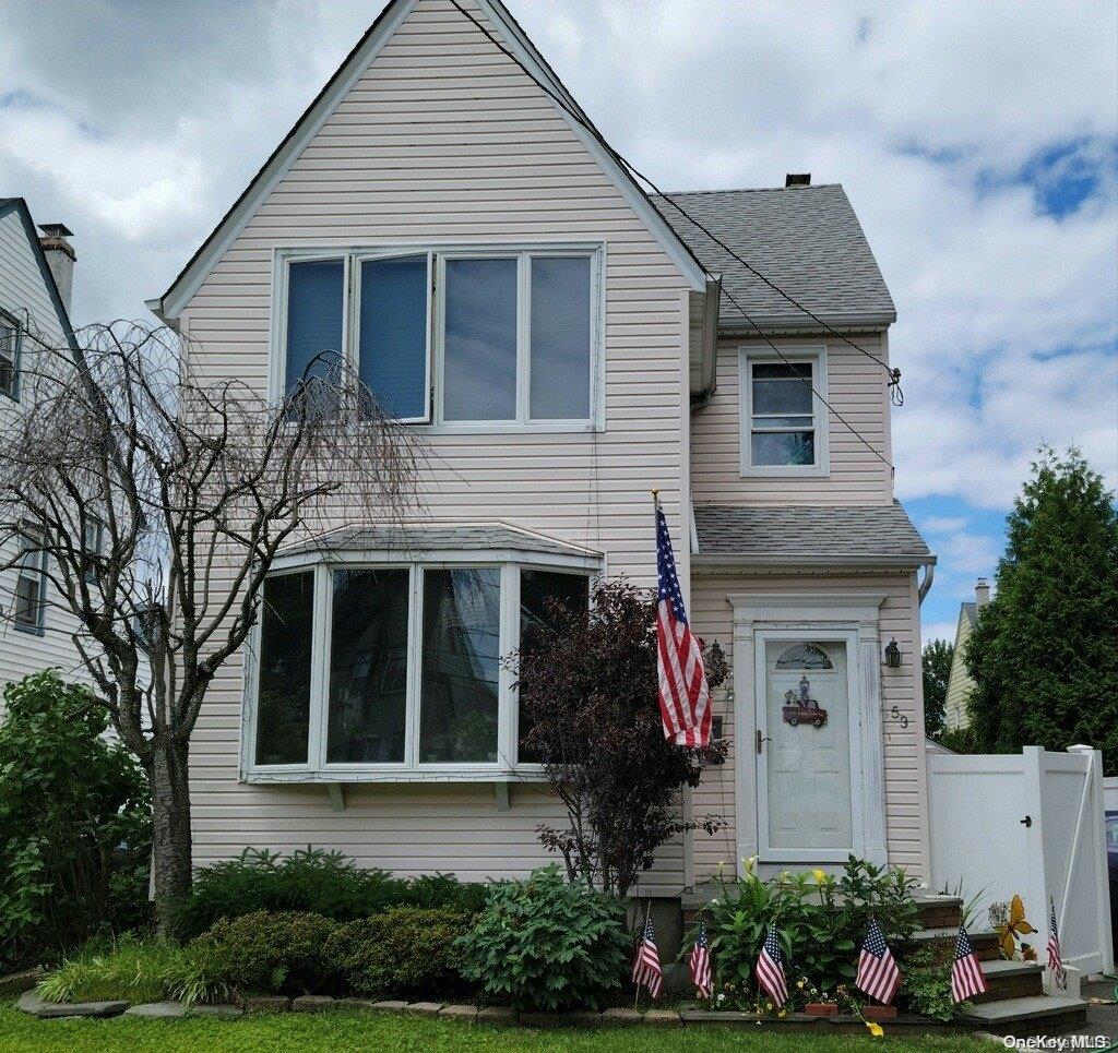 53 Liggett Road Valley Stream, NY 11581 - Photo 1 of 1 a front view of a house with a yard