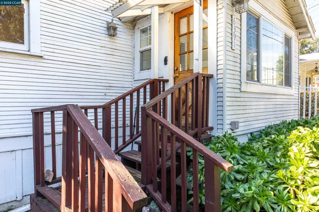 a view of a balcony with stairs