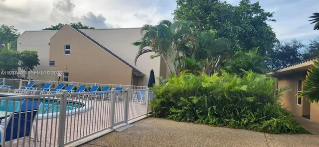 a view of a yard with plants