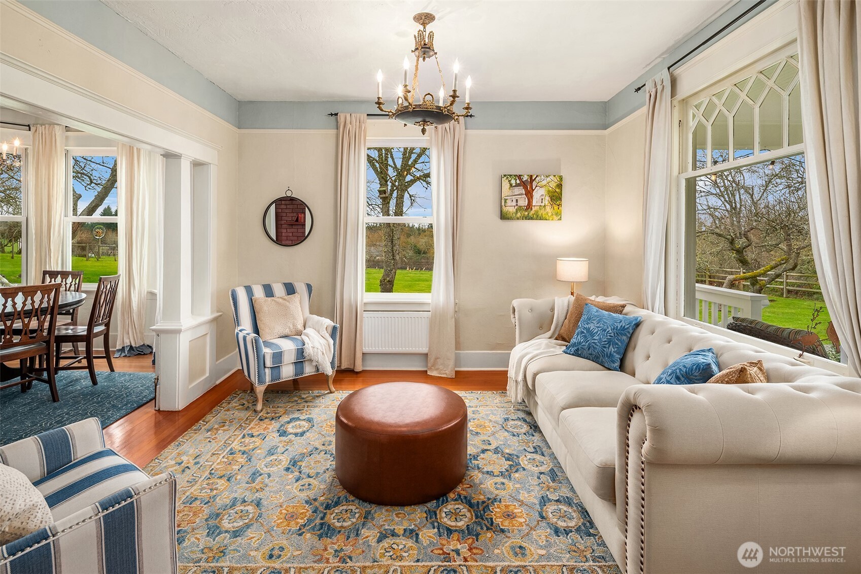 6007 Southwest 240th Street Vashon, WA 98070 - Photo 11 of 40 a living room with furniture and a large window