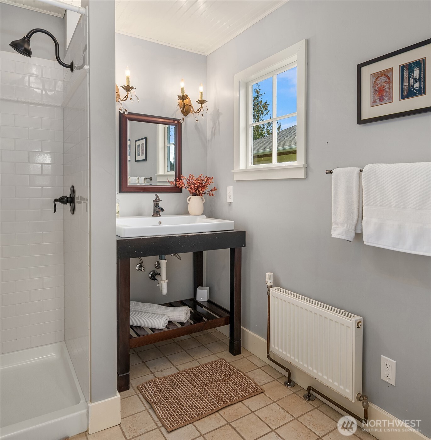 6007 Southwest 240th Street Vashon, WA 98070 - Photo 17 of 40 a bathroom with a sink toilet and shower