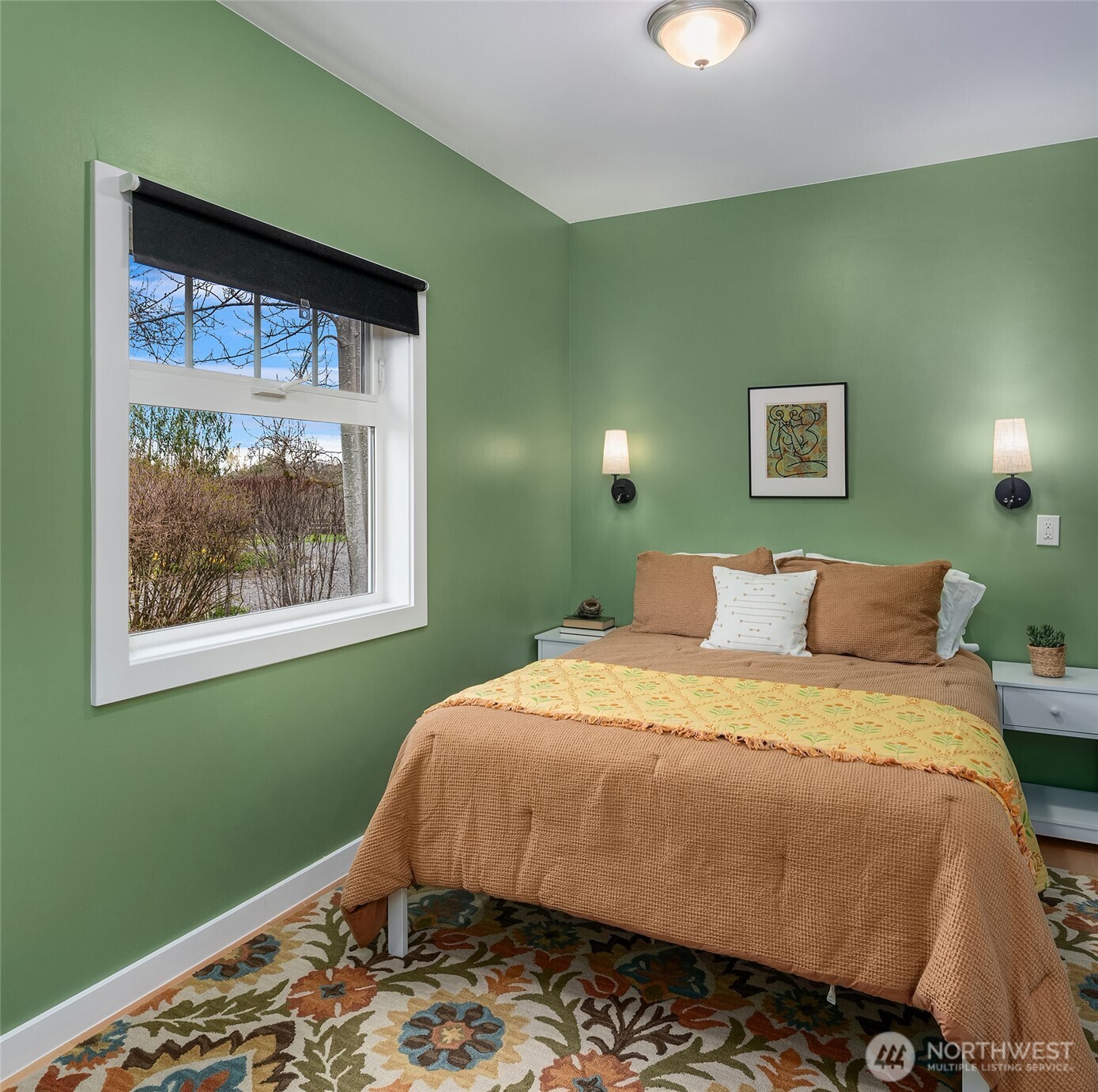6007 Southwest 240th Street Vashon, WA 98070 - Photo 27 of 40 a bedroom with a bed and a window